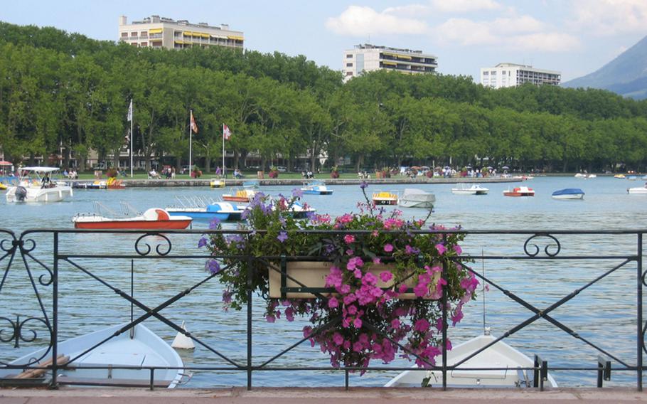 Lac d'Annecy sits between the old and the new. Modern high-rise apartment buildings provide a background for Annecy's lake. But  only a short distance from the lake is Annecy's medieval old town.