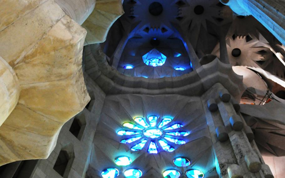 Antoni Gaudi was impassioned by glass, light and incredibly high ceilings. Quoting  a placard of his thoughts in La Sagrada Familia church, still unfinished to this day: The highest large windows, those in the main nave, will be of plain glass, because their purpose is to illuminate the vaults which are decorated with mosaics.