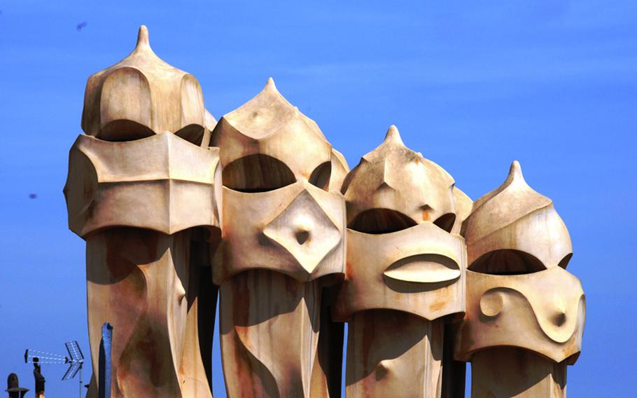 Eccentric chimney tops on the roof of La Pedrera, or sometimes called Casa Mila.
