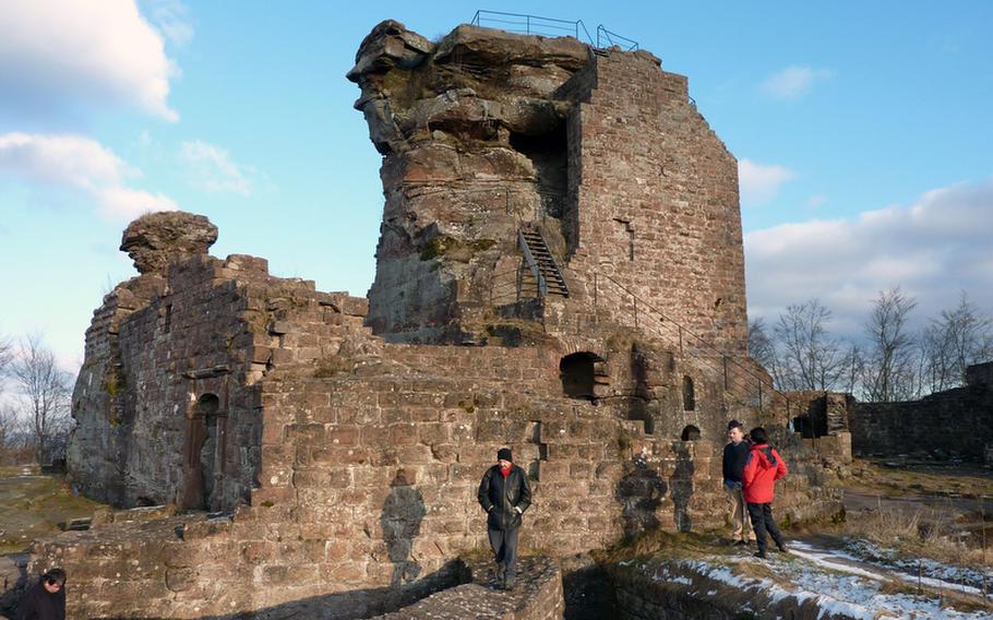 Tourists wander around the ruins of Chateau de Hohenbourg, one of many castles that line the French-German border in the northern Alsace.