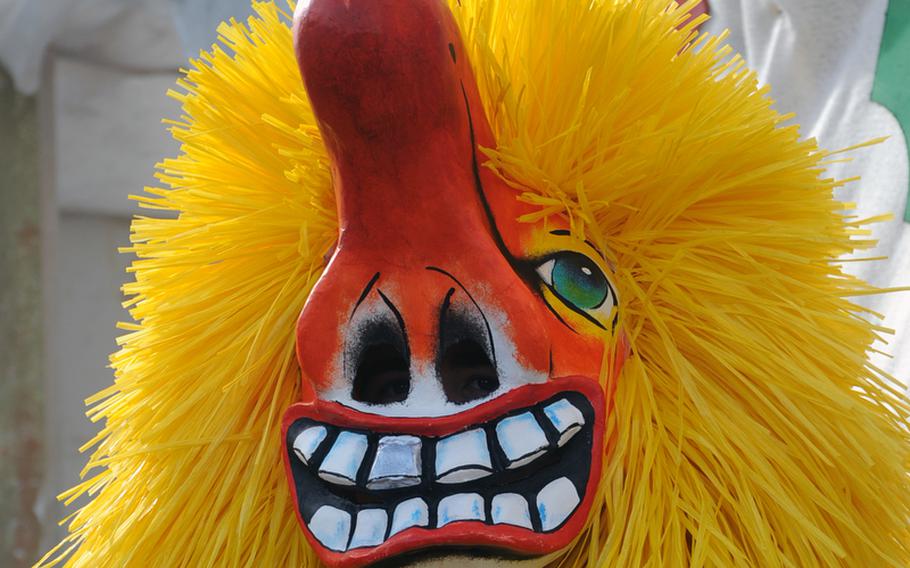 One of the colorful, quirky participants in the Basel, Switzerland, Fasnet parade.