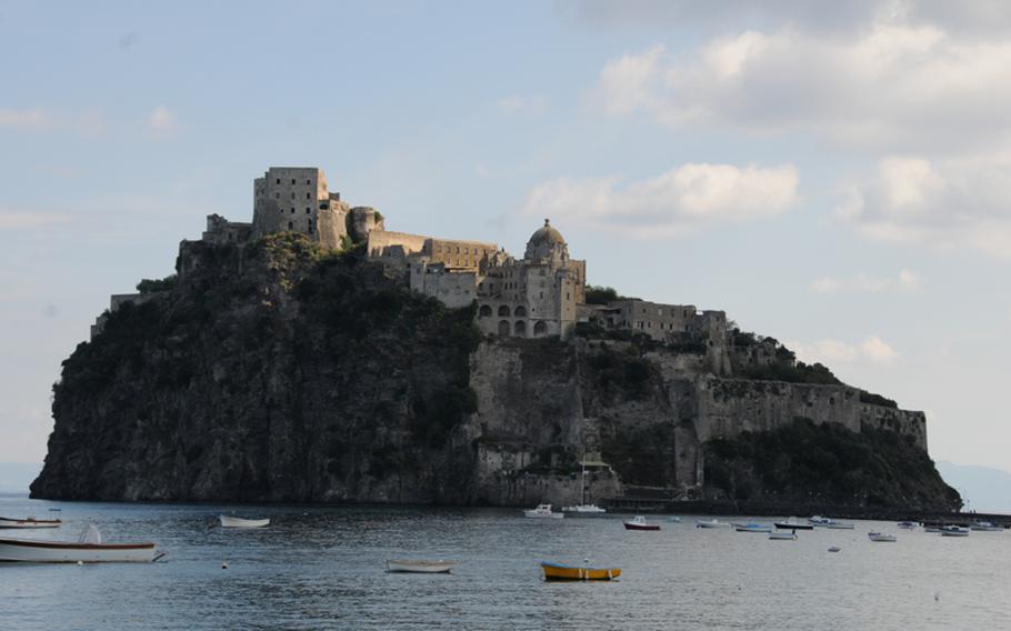 The sun breaks through the clouds to shine on Aragonese Castle, which was built in 474 B.C. and has served as a fortress, church and now Ischia's most-visited monument.