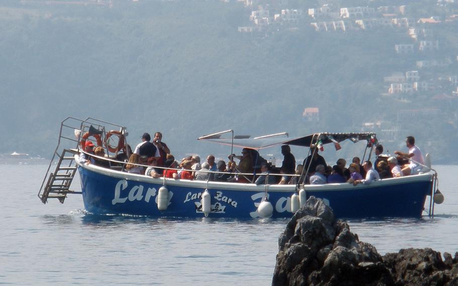One of several boat tour companies take visitors in the bay and around the island of Dino in Praia a Mare.