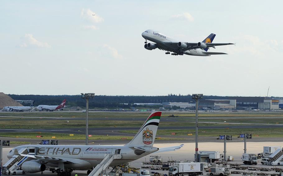 A Lufthansa Airbus A380 takes off from Frankfurt International Airport. The A380 is the world&#39;s largest passenger plane.