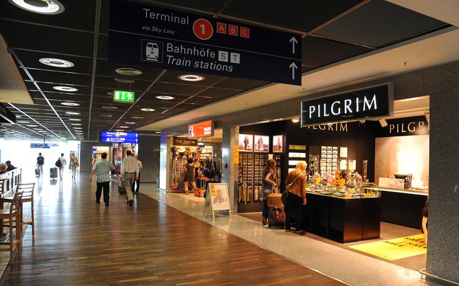 Besides watching airplanes take off and land, visitors will find plenty of places to eat, drink and shop at  Frankfurt Airport. Seen here is Terminal 2&#39;s new shopping plaza.