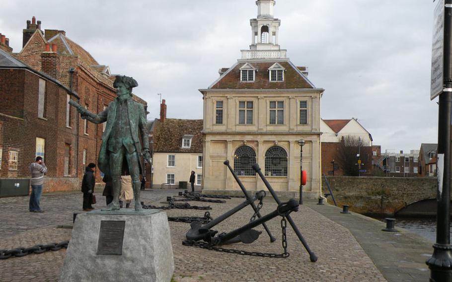 A statue of explorer George Vancouver, who was born in King's Lynn, England, sits in front of the town's Custom House. 