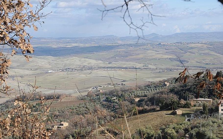 Breathtaking panoramic view of the rolling hills that are synonymous with the Tuscan region of central Italy of Montalcino  shows the town's setting setting in its glory.