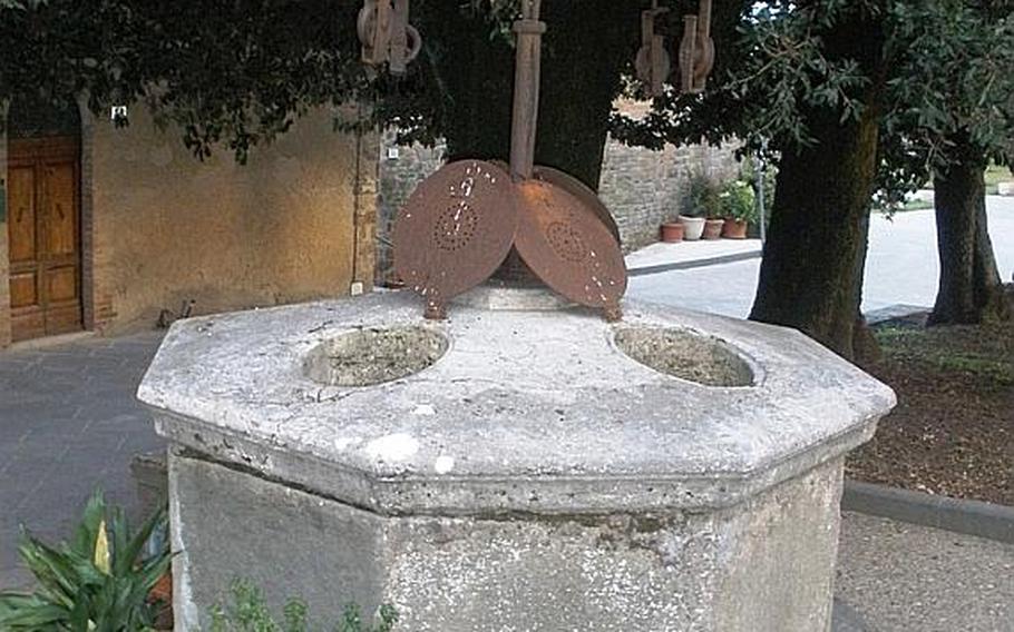 An old cistern now decorates a small piazza in Montalcino.