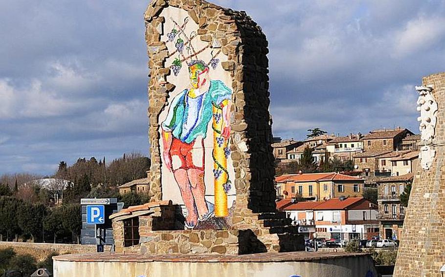 Colorful artwork that naturally includes grapes on the vine decorates the main roundabout leading into Montalcino.