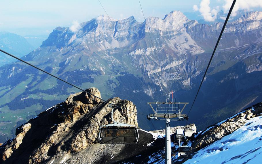 The Ice Flyer chairlift on Mount Titlis glides over glacier crevasses and offers incredible views of surrounding peaks.
