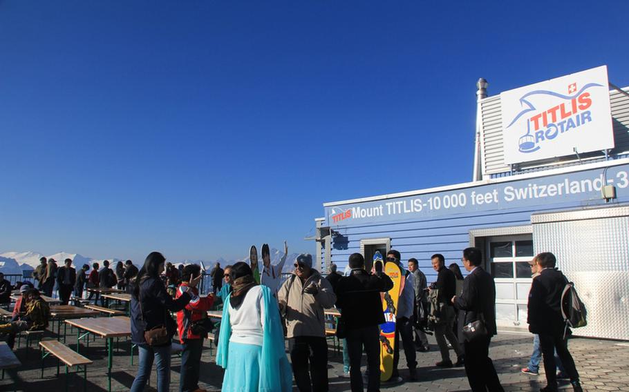 Tourists have a field day with their cameras on the viewing terrace at the top of Mount Titlis near Engelberg. While Engelberg is known as a ski resort, the town and its surroundings offer plenty of summertime activities, too.