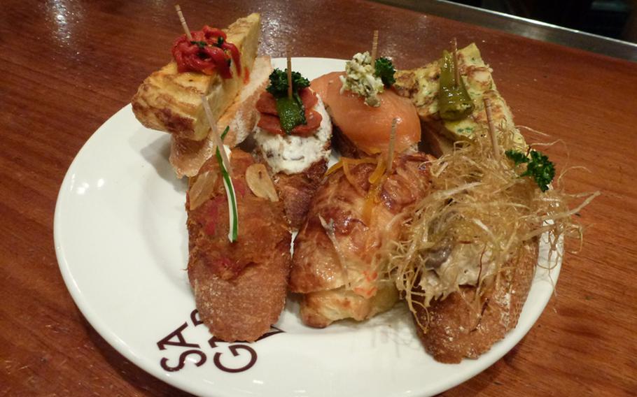 Basque-influenced food, such as this plate of pintxos, the local version of tapas, is on menus in Valencia.