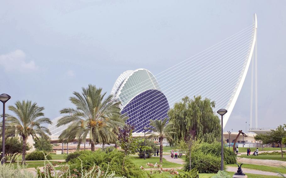 The IMAX theater and the sweeping cables of La Peineta bridge are dramatic landmarks in Valencia&#39;s Turia Gardens.