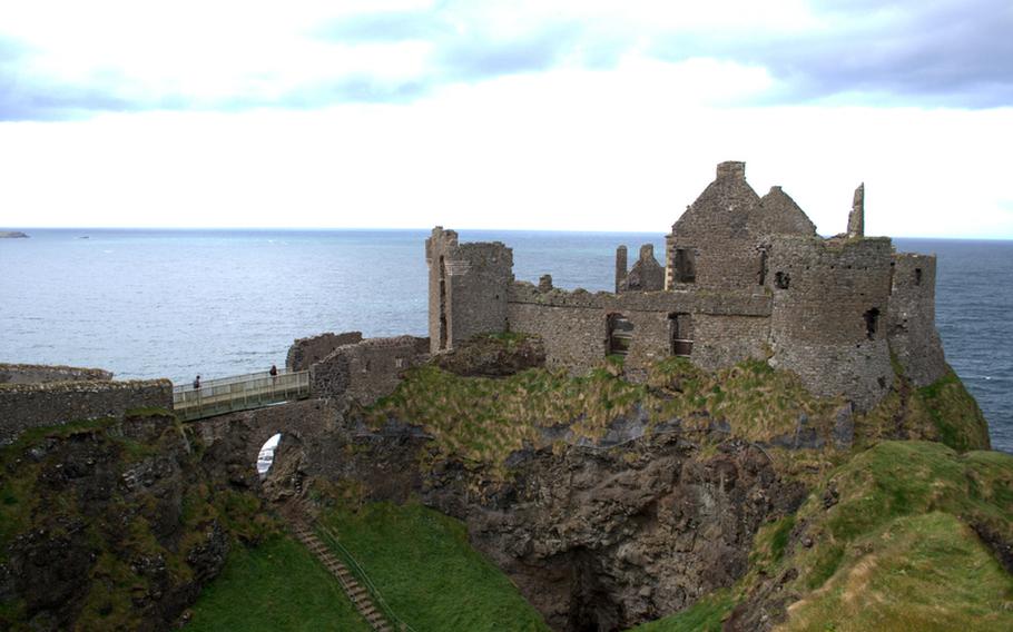 The crumbling ruins of Dunluce Castle offer a romantic picture of days of yore in Ireland. The castle lost part of its structure when its kitchens and several servants plunged into the sea in the 17th century.
