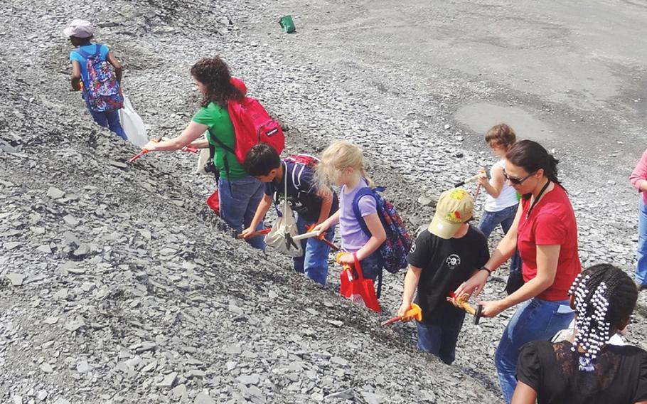 Adults and children from Böblingen Elementary Middle School in Stuttgart get in on the fossil hunting at the Urwelt-Museum Hauff. The museum is named for the Hauff family, which has been involved in fossil excavation in the area for three generations. 