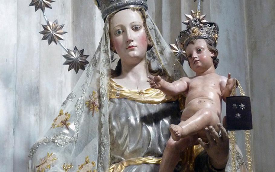 A beautiful Madonna with child in the Santa Maria del Monte church.