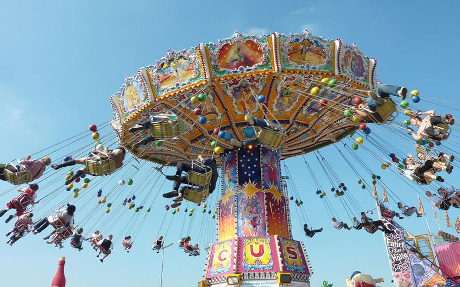 The world-famous beer bash also offers fun rides for families, including this carousel swing, bumper-cars, a free-fall tower and several large roller coasters.