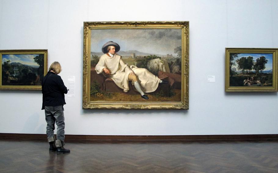 A visitor to the Städel checks out a painting of Frankfurt, Germany's local hero, Johann Wolfgang von Goethe, by Johann Heinrich Wilhelm Tischbein. It hangs at the entrance to the museum's modern art collection.