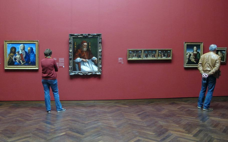 Visitors to Frankfurt.s Städel art museum check out works in the Old Masters collection. The collection highlights such artists as Botticelli, Bosch, Dürer, Rembrandt and Vermeer.
