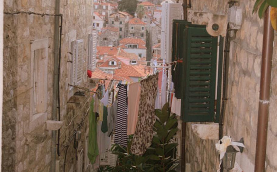 The narrow lanes climbing north of Stradum offer peace from the busy commercial heart of Dubrovnik, Croatia, as well as a peak at the everyday life of the city's residents.