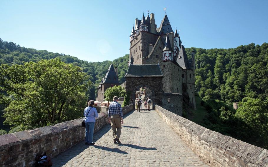 The easiest route to Burg Eltz involves parking about a 10-minute walk away, then either hiking or taking a shuttle to the foot of a causeway that takes you across the valley floor to the castle.