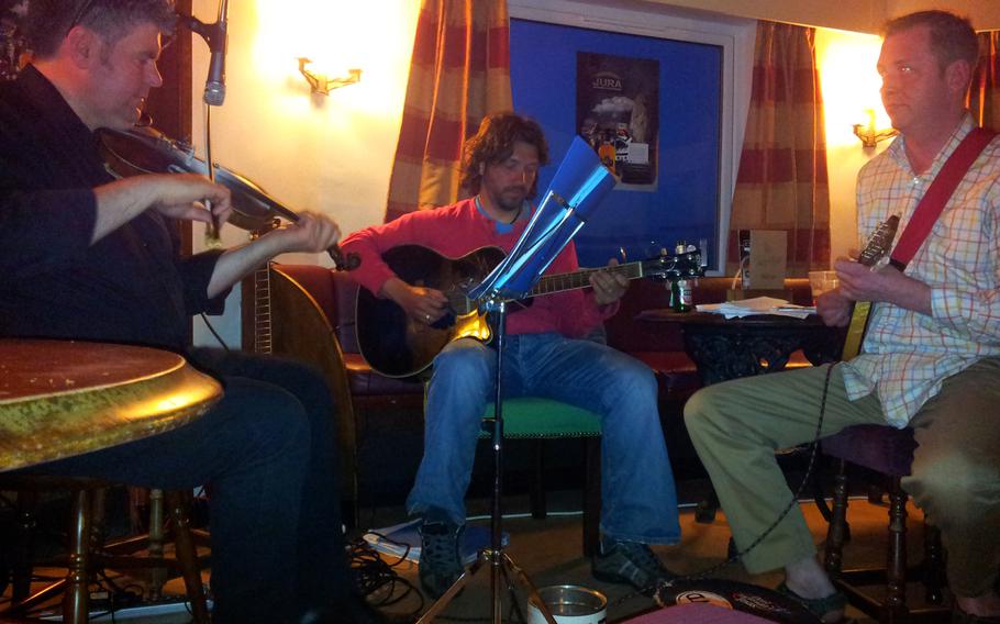 Hebridean folk musicians take center stage late into the night at the Jura Hotel on the Scottish Isle of Jura.