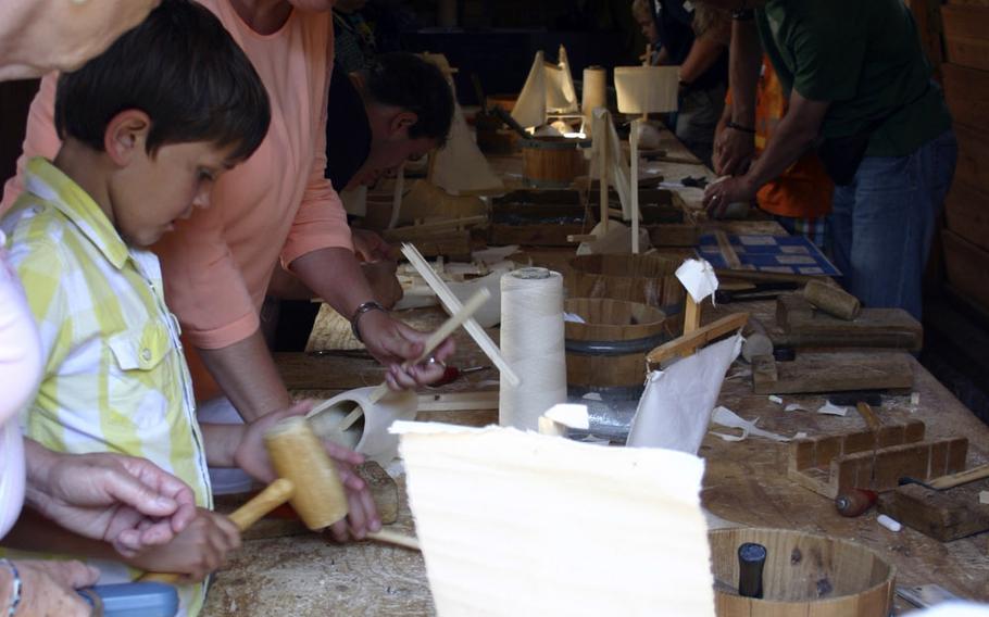 Children and parents are invited to make a sailboat out of a "klomp," or wooden shoe, for a small fee.