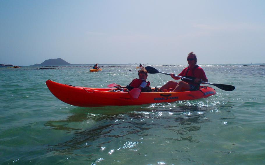 Author Joe Cawley and son, Sam, head out for a kayak-and-snorkeling safari with other adventurers on the island of Fuerteventura in the Canary Islands.