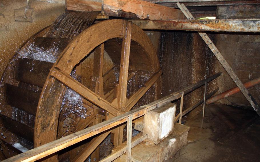 The old mill wheel still churns at Eselsmuehle, which is one of six active mini-mills operating around Echterdingen-Leidenfeld, Germany.