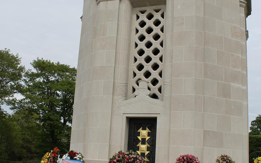 The Flanders Field Cemetery's chapel in Waregem, Belgium, is adorned with wreaths after the Memorial Day ceremony.