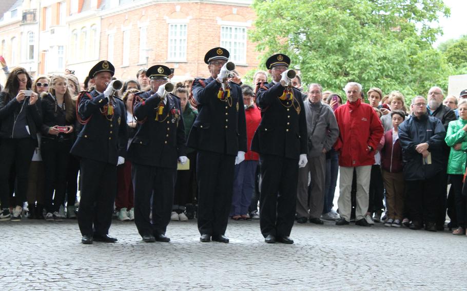 In Ypres, Belgium, buglers play a traditional final salute to fallen soldiers during the Last Post ceremony under the  Menin Gate Memorial, which honors British and Commonwealth troops who were killed in the Ypres area but have no known graves. The service, first held in 1928,is conducted every evening to honor all who fought in or near Ypres during World War I.