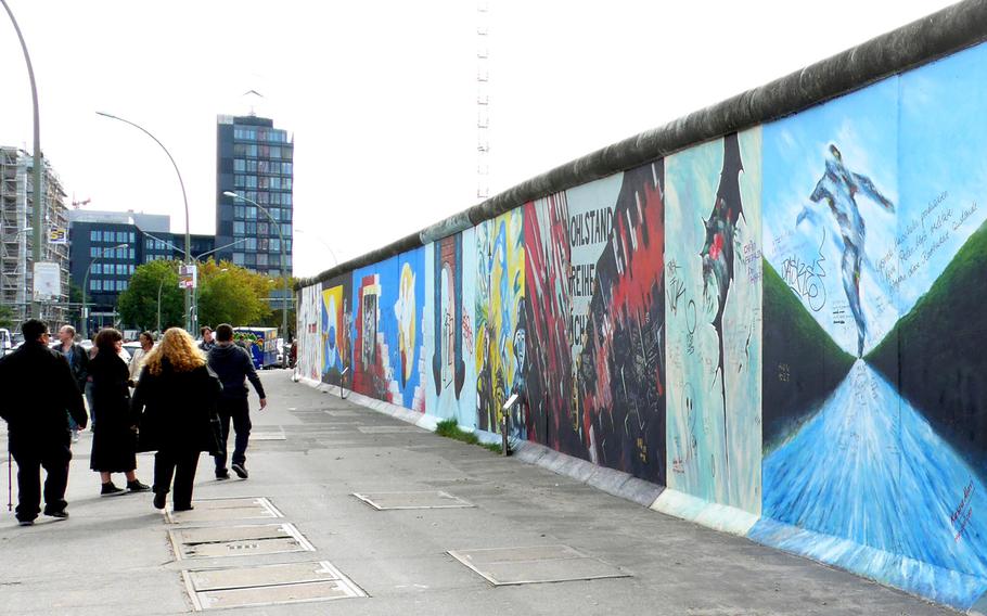 The East Side Galley,  at nearly a mile long, is the longest piece of the Berlin Wall still standing. During the Cold War, this side of the wall would have been in East Berlin and would have been blank.