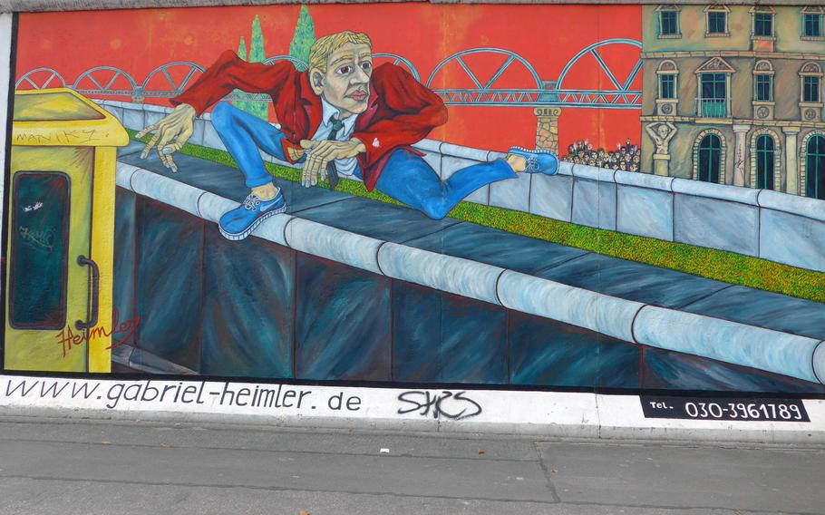 Gabriel Heimer's "Mauerspringer," or "Wall Jumper,"  on the East Side Gallery depicts a man jumping over the Berlin Wall. The gallery is one of the largest open-air galleries in the world, with more than 100 original murals.