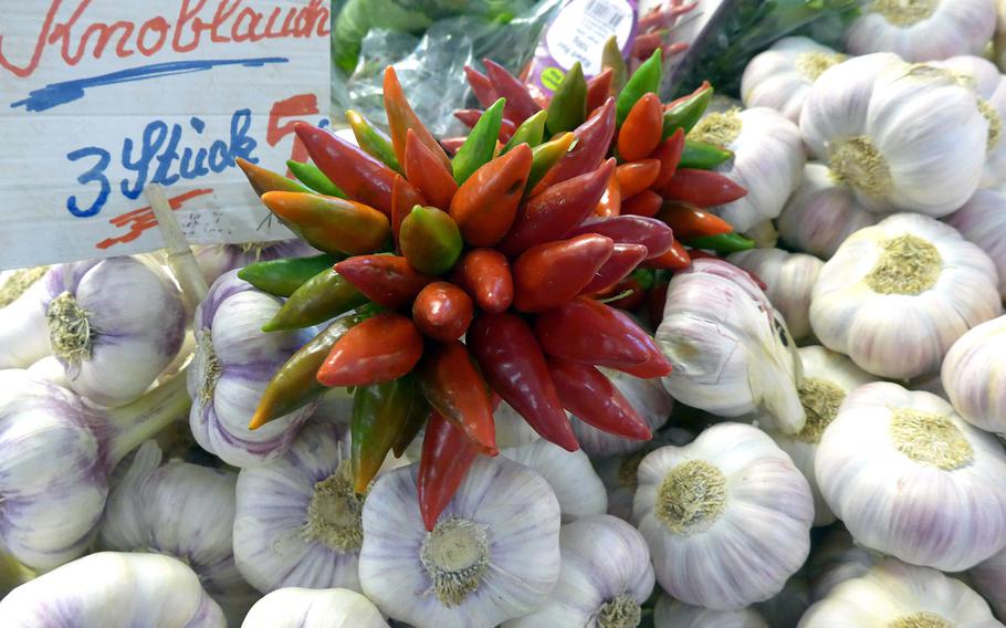 Peperoni and garlic look almost too good to eat at a stand at the Kleinmarkthalle in Frankfurt, Germany.