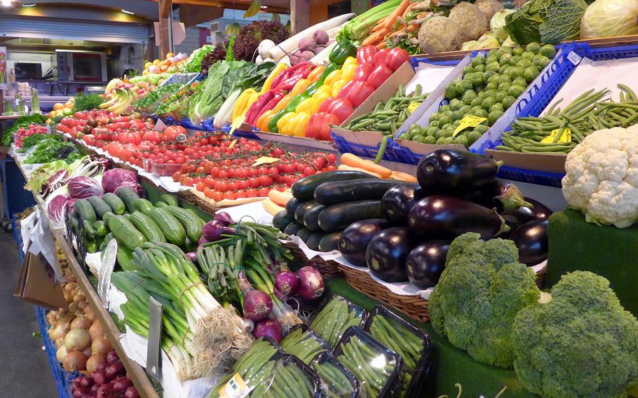 Fresh produce is neatly displayed at a stand at the Kleinmarkthalle in Frankfurt, Germany.