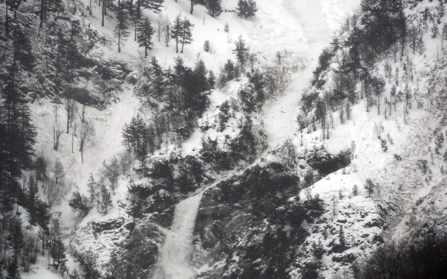An avalanche tears down a mountain in Valbona, Albania.