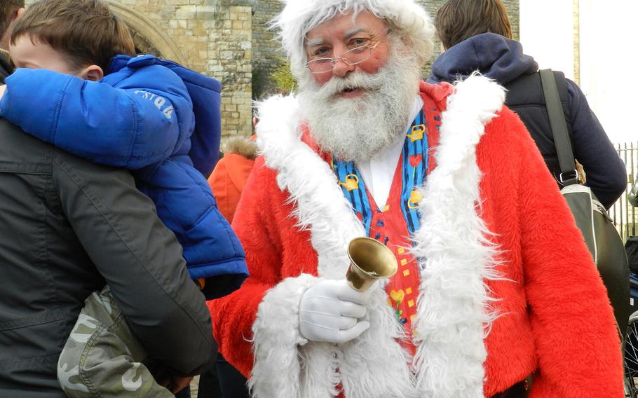 A Santa look-alike mingled with the crowds at the Lincoln, England, Christmas market in 2012, to the delight of children and adults alike.