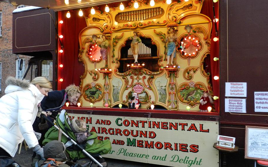 A colorful calliope added to the festive mood at the Christmas market in Lincoln, England.