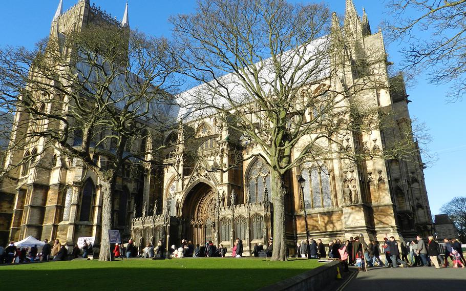 Market-goers dutifully follow the one-way-only rules as they file past Lincoln's cathedral at the start of the town's Christmas market last year. The market website says the one-way rule has been dropped for this year's market, Dec. 5-8.