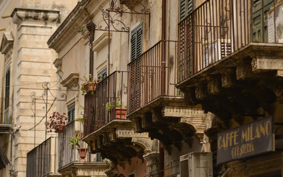 Ornate balconies line the streets in Noto's, Sicily.