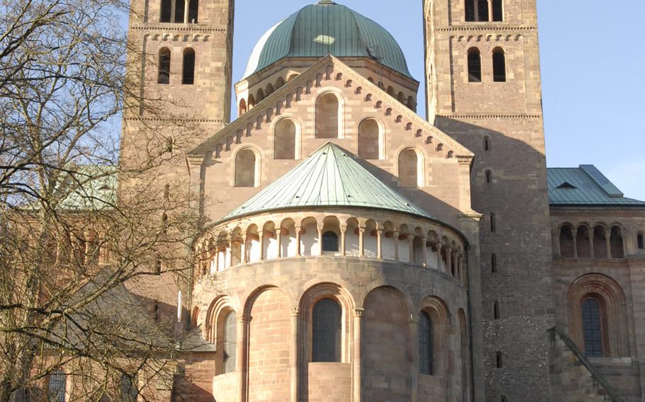 The east end of the Speyer cathedral, as seen from the garden behind the basilica. Officially known as the Cathedral of St. Mary and St. Stephen, the cathedral in Speyer, Germany, is steeped in history, a massive block of rock that stands as a timeless piece of Romanesque architecture.