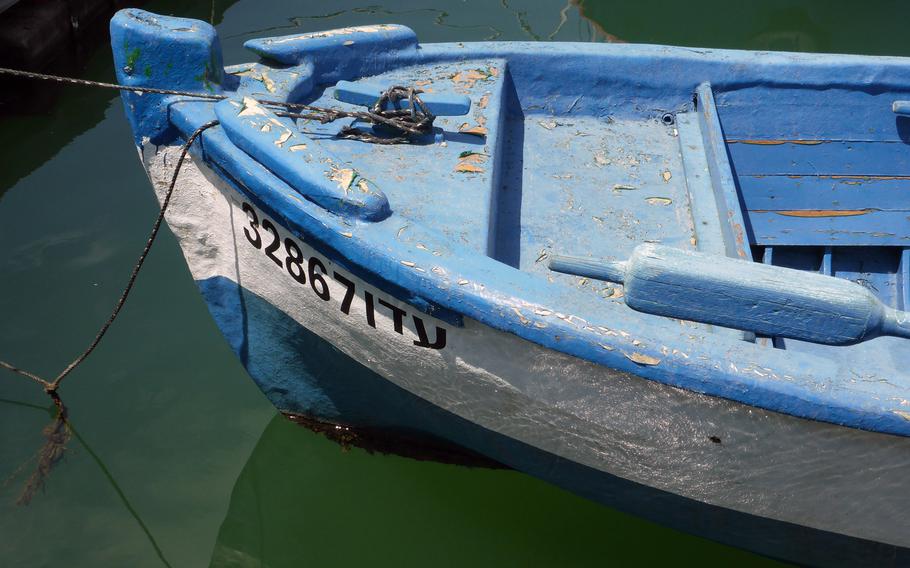 A well-worn boat sits in the old harbor of Jaffa, Israel. It was here that many Jews arrived in the late 19th and early 20th centuries in what was then Palestine.