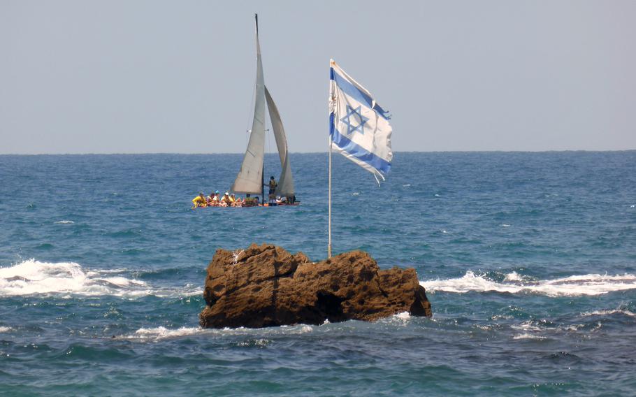 Looking out to sea from Jaffa, Israel, notice a group of rocks with one of them flying the Israeli flag. This is Andromeda’s Rock of the Greek myth in which Perseus saves a king’s daughter, Andromeda, from a sea monster. 
