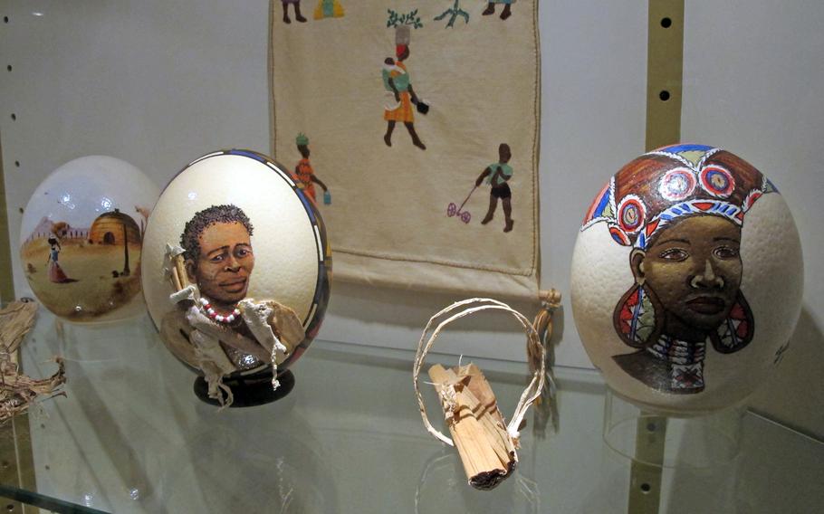 Decorated eggs had a range of themes, from flowers and peppers to these eggs painted with African scenes.