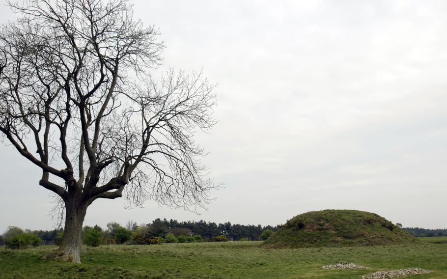 Mounds such as this one mark the Sutton Hoo burial site near Woodbridge, England. Experts have uncovered artifacts at the site as well as ancient remains buried there. Now the area is open to tourists.
