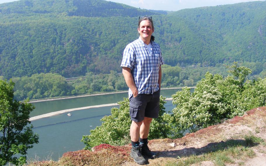Anthony Hammond stands in his vineyards high above the Rhine River just west of Rüdesheim in Germany.