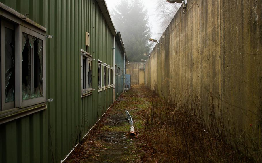 A decaying perimeter wall hasn't kept vandals from getting in and breaking windows at the U.S. military's old Langerkopf radio relay station south of Kaiserslautern, Germany.
