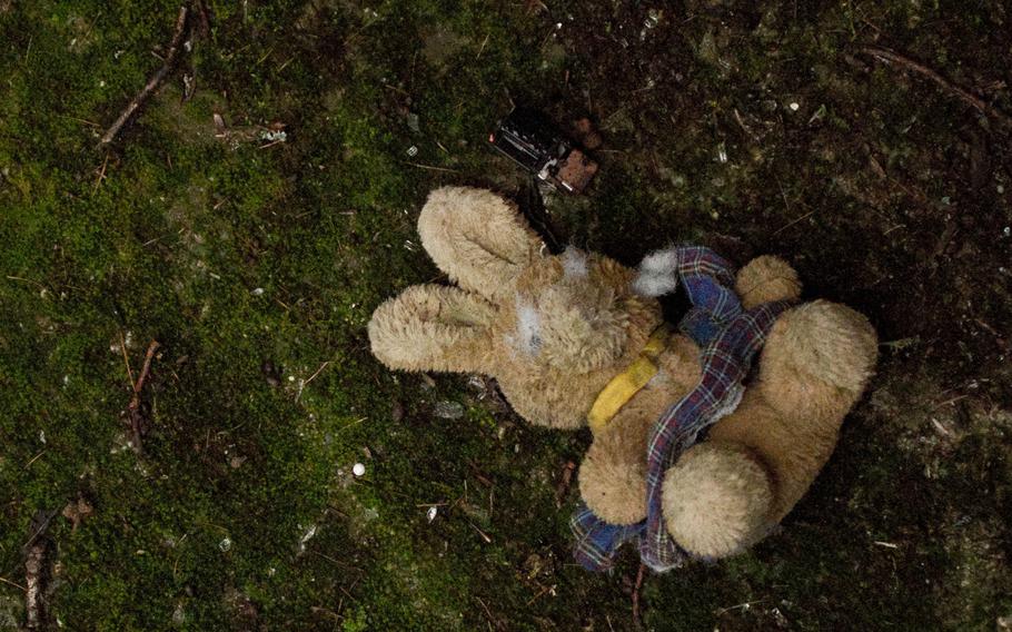A plush toy rabbit lies on the ground at the U.S. military's Langerkopf radio relay station south of Kaiserslautern, Germany. There's no telling how long it's been there.