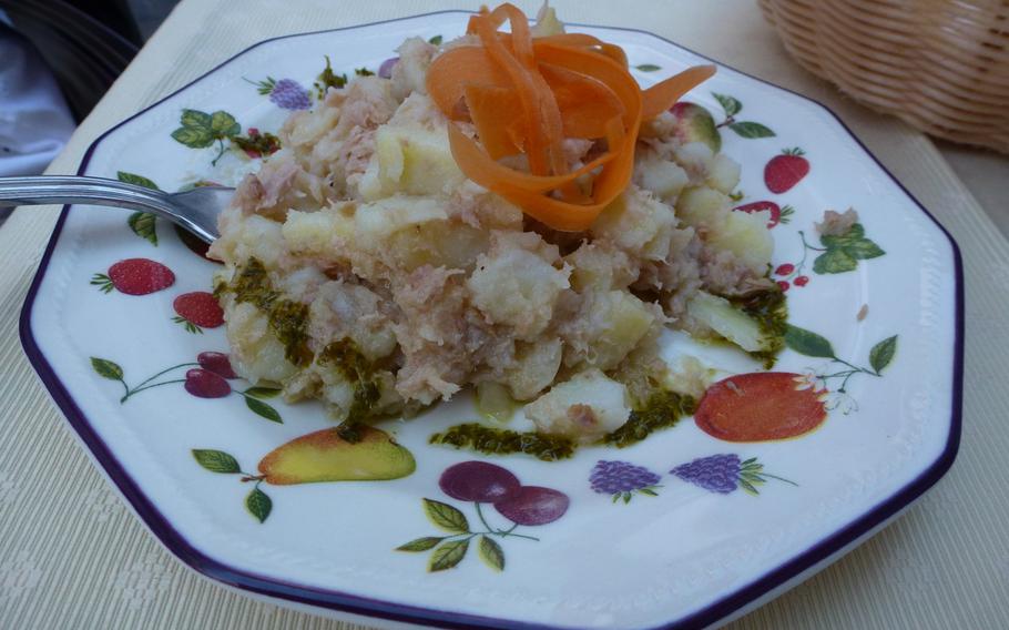 We loved this dish, a mixture of warm potatoes and tuna, which we sampled at a tapas bar on a side street in Seville's historic Barrio quarter.