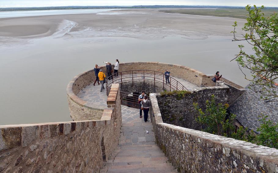 A view down the stairs from near Mont-St-Michel's abbey church to the Tour du Nord, where there is a good view of the church, the Bay of Mont-St-Michel, and the town's fortifications.